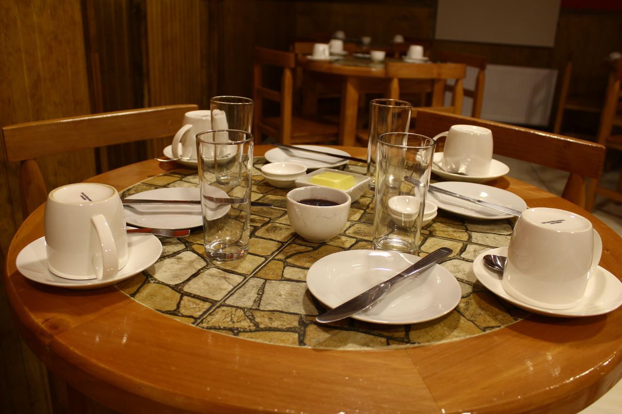 Hostal America En Puerto Natales Esterno foto